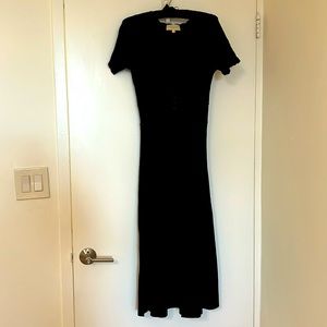 Black midi dress, with a nice decolte; Nice knit material, soft & beautiful fit